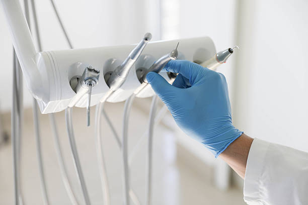 Professional Emergency Dentist technician working in Lone Tree, IA